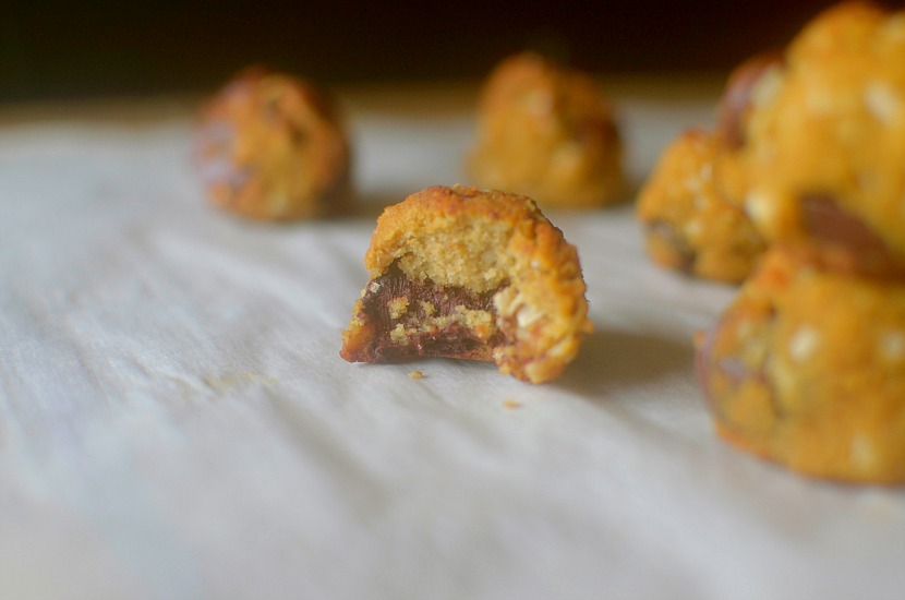 Satisfy your cookie dough and donut cravings in one w/ these Paleo Coconut Cookie Dough Munchkins! Made with coconut flour and other nourishing ingredients