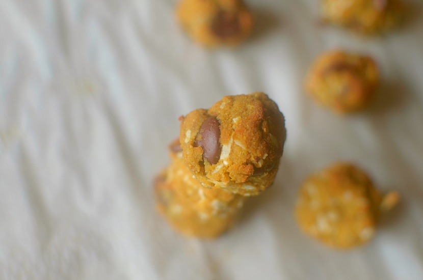 Satisfy your cookie dough and donut cravings in one w/ these Paleo Coconut Cookie Dough Munchkins! Made with coconut flour and other nourishing ingredients