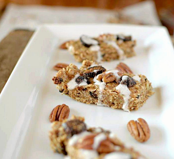 In need of a healthy snack that will satisfy you hunger as well as your sweet tooth? Make these No-Bake Pecan Fig Granola Bars with a Coconut Glaze that take no more than 10 minutes to make! Also Gluten-Free and Vegan!