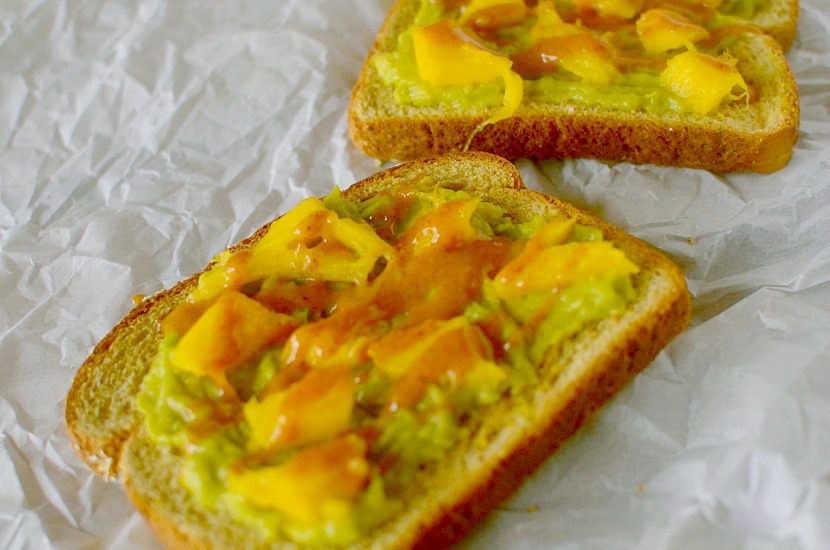 This Sriracha Mango Avocado Toast is a healthy and delicious breakfast or snack that is put together in less than 5 minutes and has a delicious almond butter-sriracha drizzle! Also can be paleo, vegan and gluten-free!