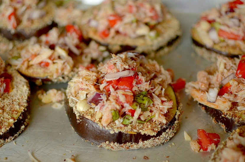 Need a crowd-pleasing appetizer? Make these Crab Bruschetta Eggplant Toasts! Full of flavor and paleo + whole 30 friendly!