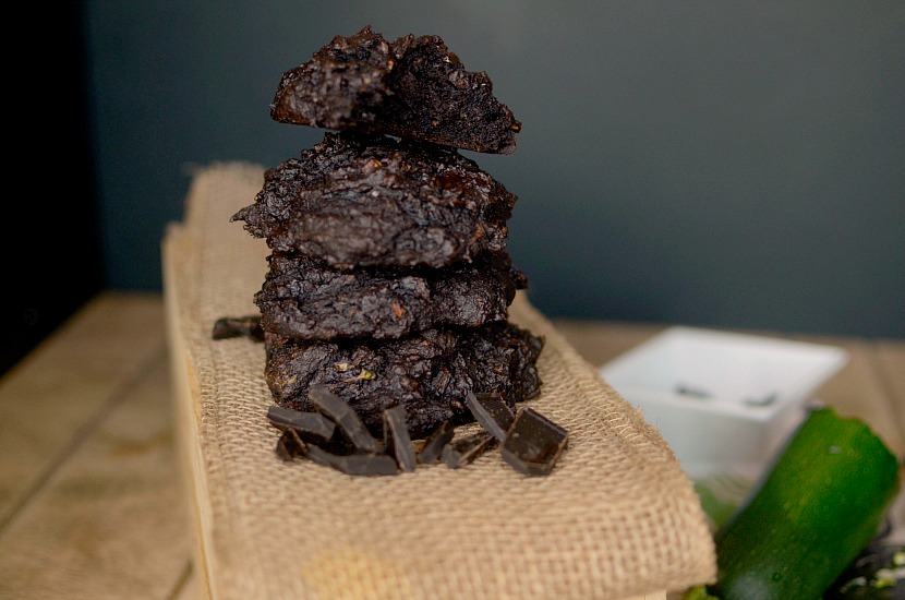 Love muffin tops? Make these Dark Chocolate Chunk Zucchini Muffin Tops! No need to waste the bottom with this recipe! Super simple, and secretly healthy!