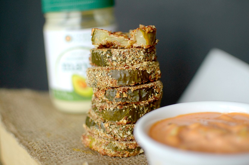 Need a little spice in your life? Make these healthy Spicy Fried Pickles with Sriracha Mayo Dipping Sauce! Baked instead of fried and paleo-friendly!