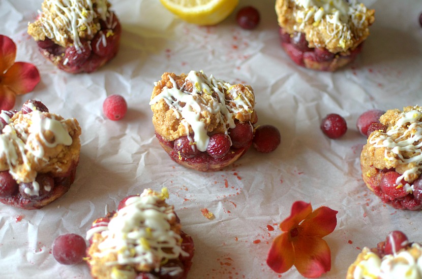 Healthy Lemon Cranberry Peek-A-Boo Pancake Muffins are bursting with juicy cranberries and drizzled with white chocolate, for a simple recipe made easy with pancake mix! Also gluten-free and vegan options!