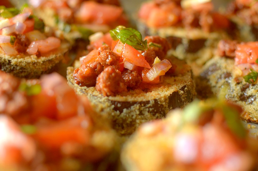 Whole 30 Spicy Chorizo Eggplant Bruschetta Eggplant Toasts are a great tasty entree that are filled with hearty, nourishing ingredients! Super easy to make!