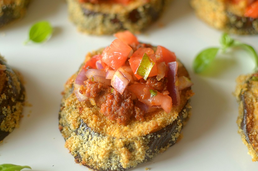 Whole 30 Spicy Chorizo Eggplant Bruschetta Eggplant Toasts are a great tasty entree that are filled with hearty, nourishing ingredients! Super easy to make!
