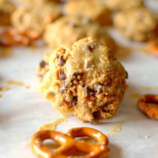Craving sweet and salty?  Make these healthy Peanut Butter Pretzel Oatmeal Chocolate Chip Cookies!  They are easy to make, only 6 ingredients and can be made vegan + gluten-free!