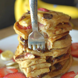 Get a healthy start to your day with these Strawberry Banana Oatmeal Pancakes! They’re made in the blender, sweet and filling and packed with protein!﻿